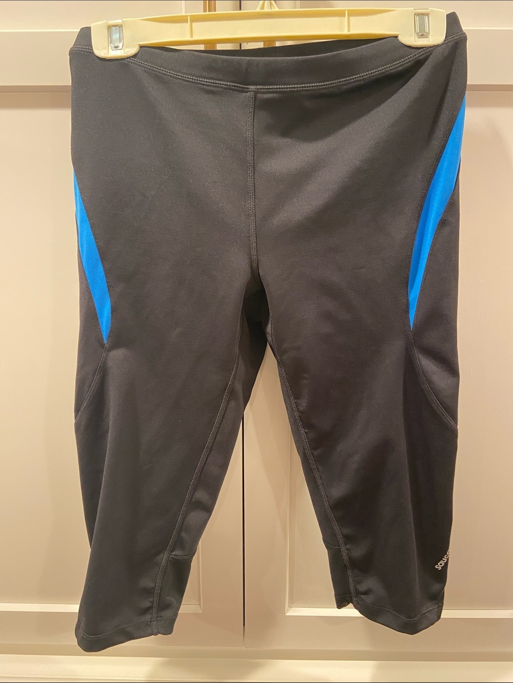 Saucony Black Capri Leggings with Blue Side Panels